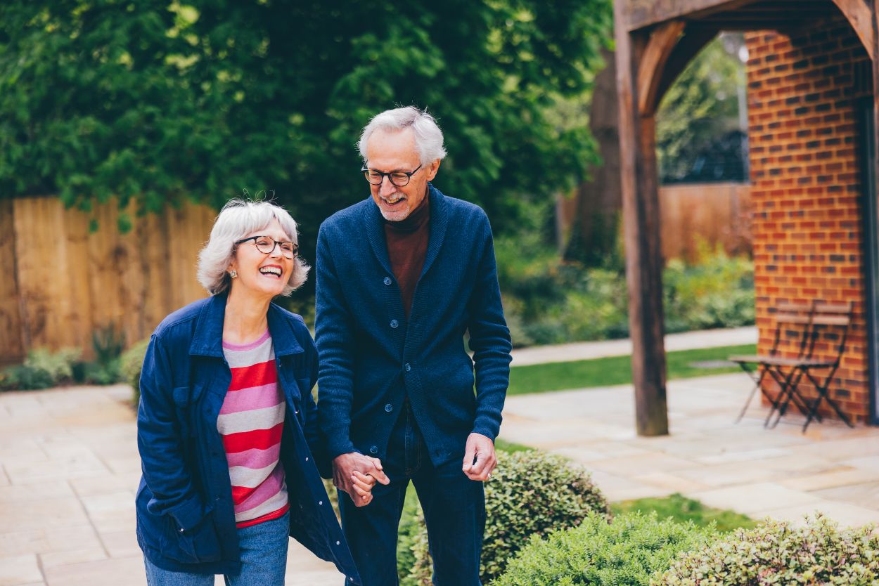 Happy Elderly Couple holding hands