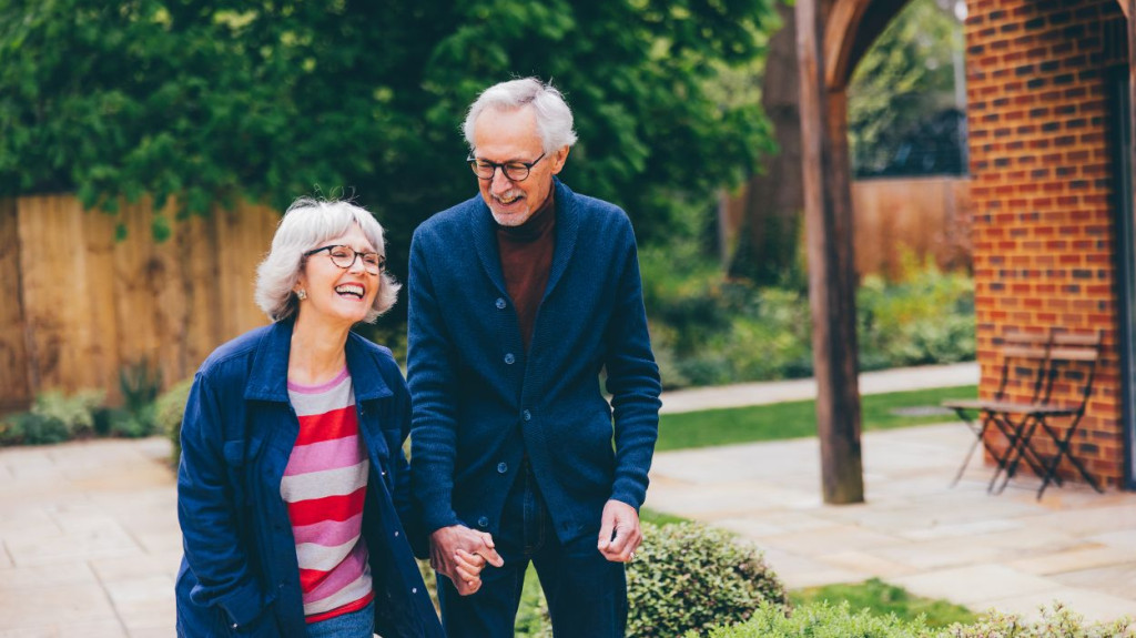 Happy Elderly Couple holding hands